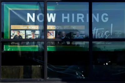 The number of Americans filing for jobless benefits last week rises to highest level in eight months