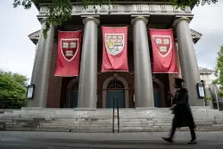 Trump administration moves to cancel remaining federal funds to Harvard